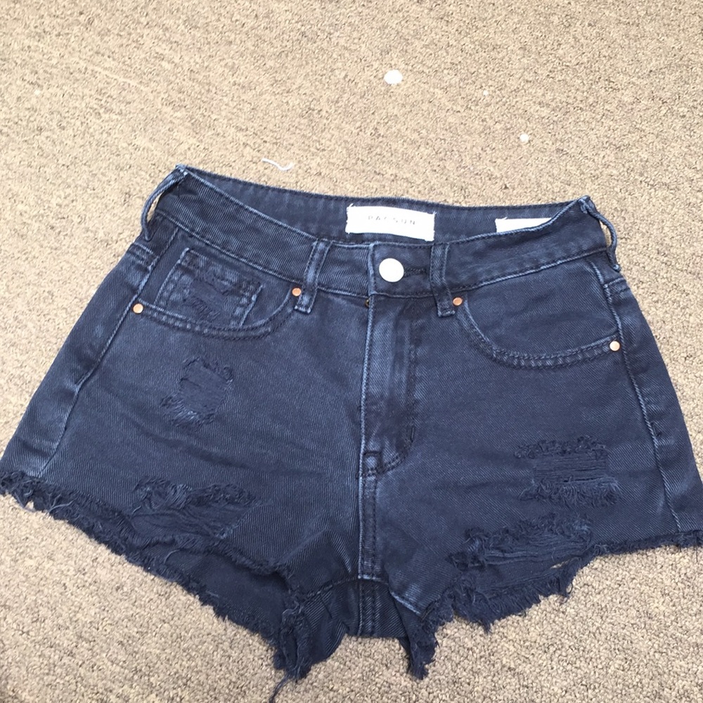 packing black jean shorts